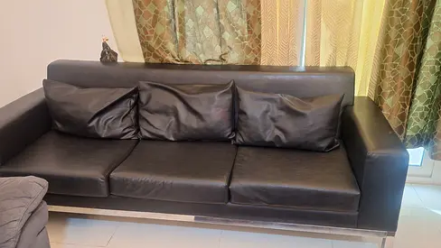 Stylish Black Sofa with Cushions