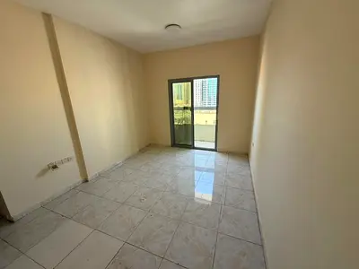 Two-bedroom apartment with a living room for annual rent in Al Nuaimiya 1 – next to Gulf Bridge