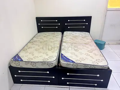 Two single beds with mattresses urgently selling today .. Fixed price !!