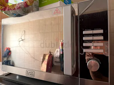 Black+Decker countertop microwave - used  working