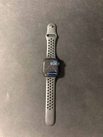 Apple Watch with black perforated Nike band — it works really good