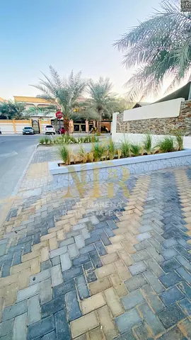 Luxury corner villa in Al Rawda 3 with a private pool and 5000 sq ft of space, including electricity, water, and air conditioning.