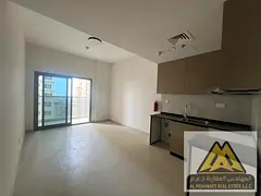 Studio apartment for annual rent in Al Aamra Residence Towers, Ajman. Spacious area with balcony, ki