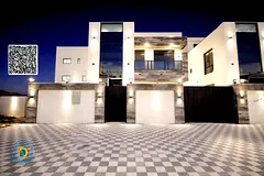 Modern villa with 6BR and a roof in Al-Helio 2, Registration fees included. Freehold . Bank financin