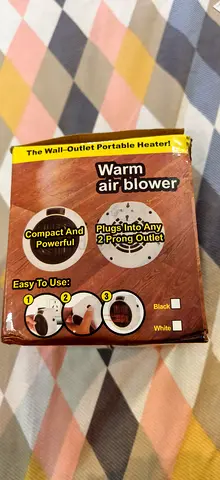 Compact Wall-Outlet Warm Air Blower - Plug-in Heater