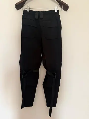 Black cargo jogger pants with adjustable straps — gently used