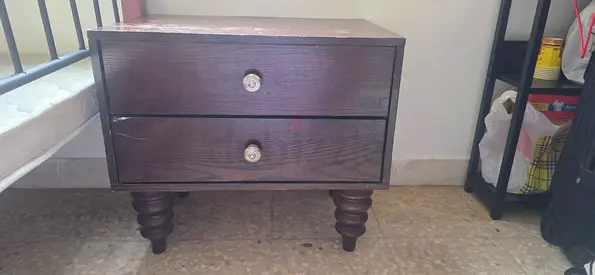 Dark wood two-drawer nightstand (bedside table)