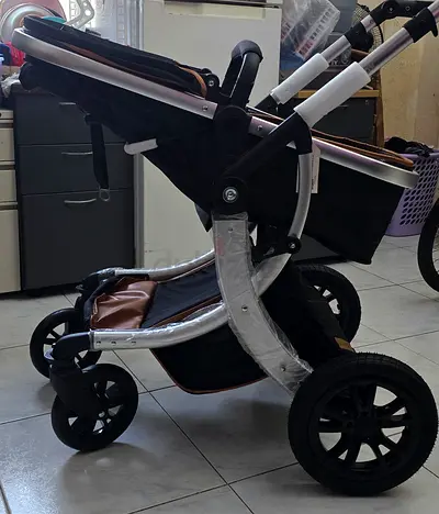 Used once pram stroller with reclining seat and large wheels almost brand new