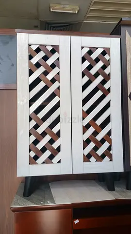 My small wooden cabinet with lattice doors