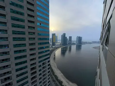 🏢 Apartment for Sale in Masaken Al Waha Tower – Luxury First-Row Lakefront 🌊