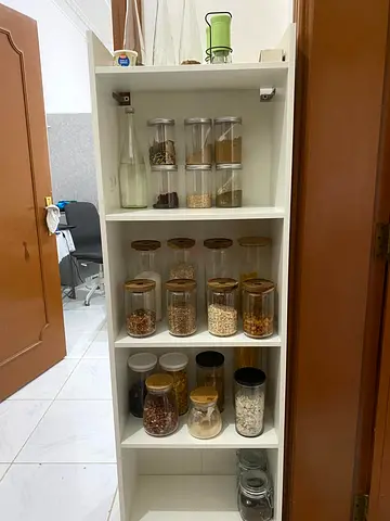 Slim white pantry cabinet - sturdy kitchen storage (used)