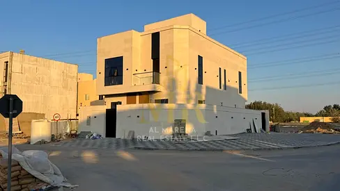 Two floors and a rooftop at a bargain price, including registration and ownership fees, on the main street, ready to move in, in one of Ajman's most p