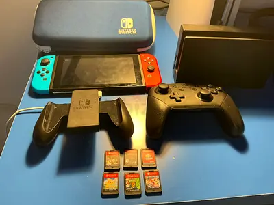 Nintendo Switch Bundle with Pro Controller + 6 Games – 850 AED – Dubai