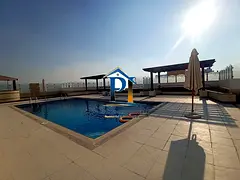 **CHILLER FREE**LUXURY FULLY FURNISHED 1BHK WITH BALCONY GYM POOL AND CAR PARKING AVAILABLE OPPOSITE