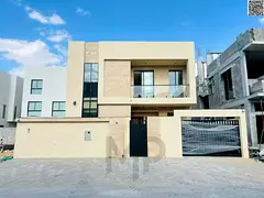 Villa for sale, including registration fees, on the main street, ready to move in, in one of Ajman&#