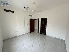 A spacious two-bedroom apartment with a living room is available for rent in Al Mowaihat 3, Ajman. T