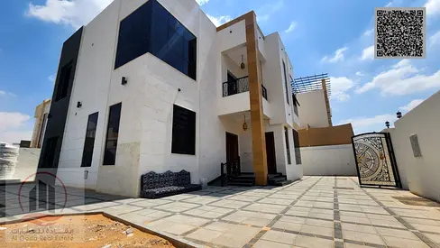 Villa for sale in Ajman, Al Zahia area. 5 master bedrooms, living room, majlis, and maid's room. Freehold ownership for all nationalities. Bank financ