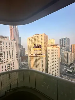 Studio for sale in Al Nahda 1, high floor with balcony, rented for AED 3,000/month. Freehold. AED 28