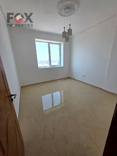 2BR apartment for annual rent in Al Nuaimiya 3, Ajman, free parking, balcony, quality finishing, nea