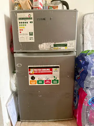 compact silver mini fridge with freezer — not working