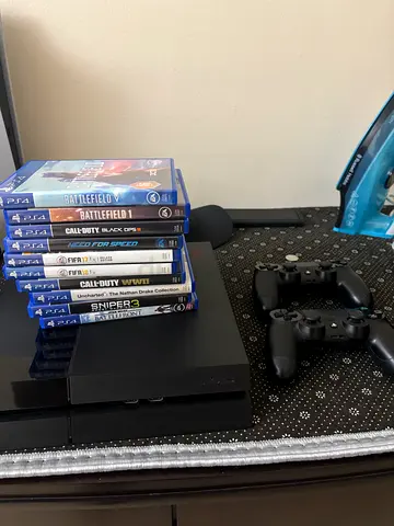 PlayStation 4 with games for sale