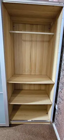 Light wood wardrobe with shelves and sliding door - used