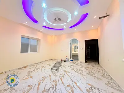 Luxury villa for rent in Al Helio 2, Ajman, with 6 bedrooms and a roof terrace, at an excellent price and close to all services.