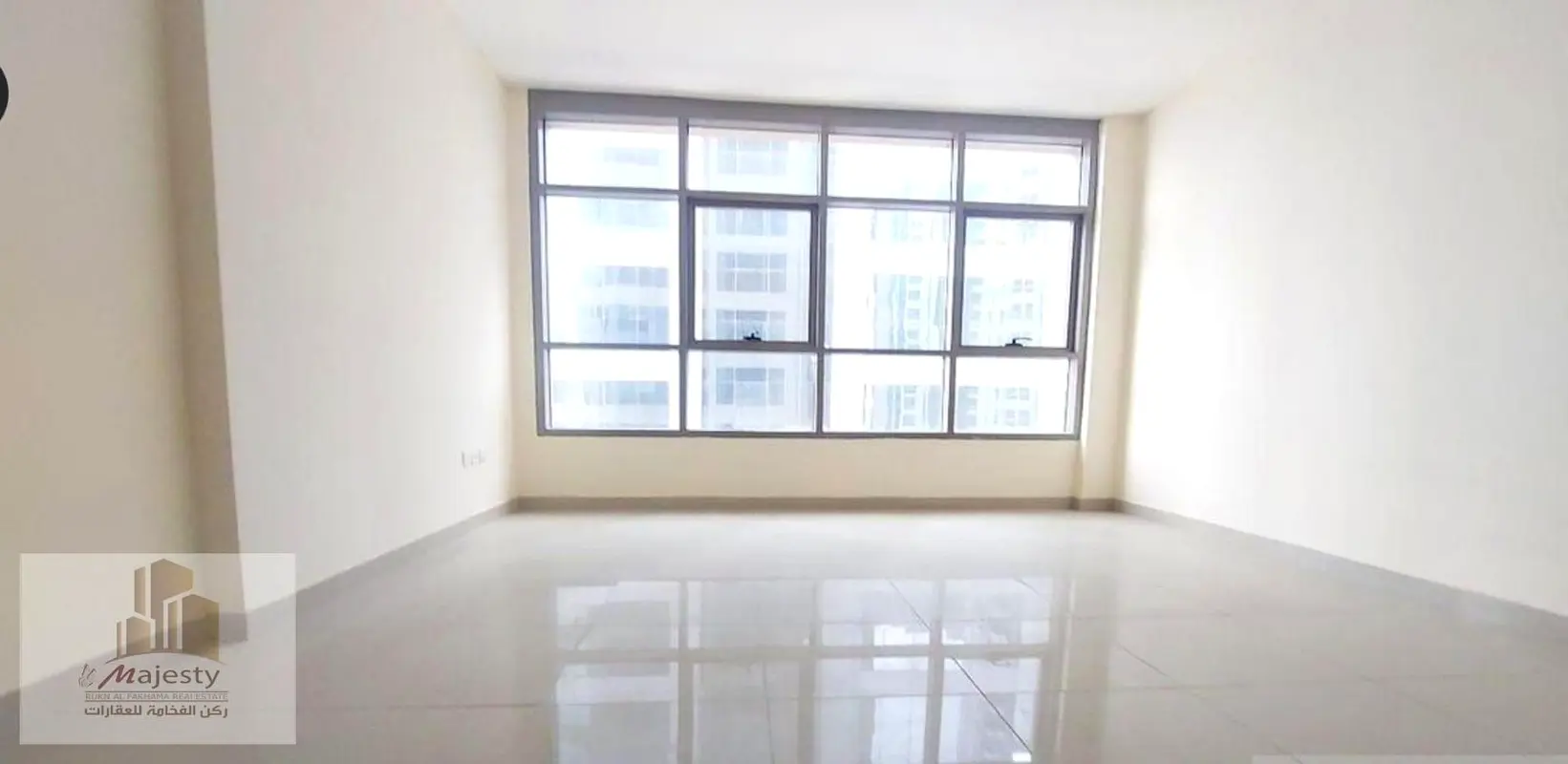 For sale in Sharjah, Al Nahda area: Master bedroom and living room