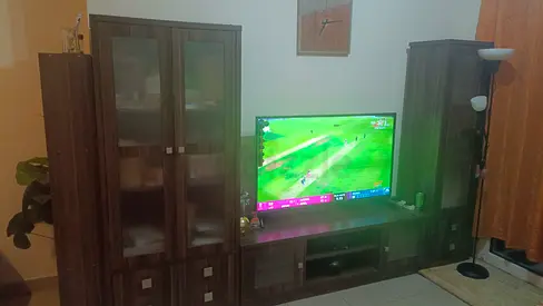 Pan home-Dark wood TV entertainment center with glass-front cabinets and 51i inch tv 2years for sale