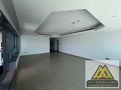 Luxury two-bedroom apartment for annual rent in Corniche Tower, Al Rumaila 2, Ajman. Sea and city vi