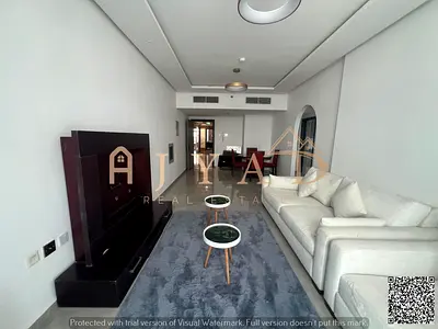 For annual rent, first occupancy, brand new tower, beautiful two-bedroom apartment with a living room in Al Nuaimiya 3, near Dubai Islamic Bank. Free