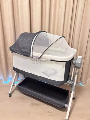 2 Electric baby beds  1 Electric Swing