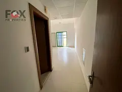 Studio for rent in Smart Tower Al Amerah Ajman, balcony, gym, pool, parking, on Sheikh Mohammed bin