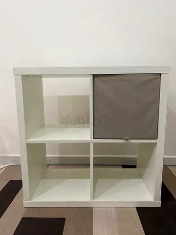White 4-cube storage shelf with fabric drawer