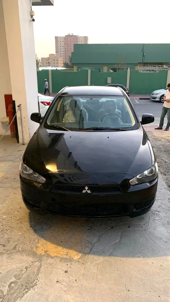 Mitsubishi Lancer EX 2013 — photo 1 of 9