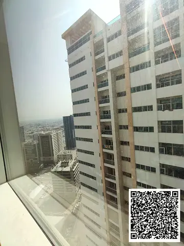 للبيع شقة واسعة في أبراج عجمان ون مع الأثاث بالكامل وموقع مميز