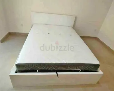 IKEA hydraulic queen‑size bed (160 × 200 cm) with  IKEA mattress