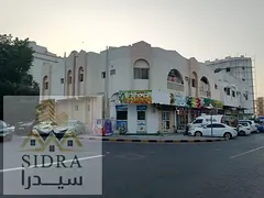 Commercial &amp; Residential Corner Building for Sale