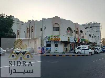 Commercial & Residential Corner Building for Sale