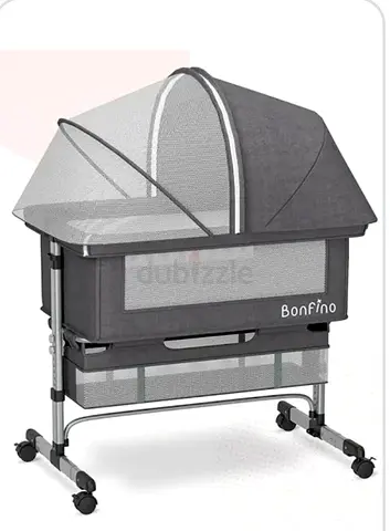 Bonfino adjustable baby bassinet with canopy, mesh sides and wheels