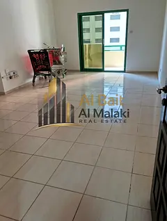 A well-maintained apartment for rent in Al Taawun area, featuring two bedrooms and a spacious living
