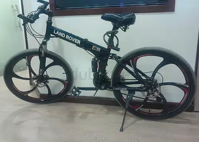 Land Rover folding electric mountain bike - 26in mag wheels (used)
