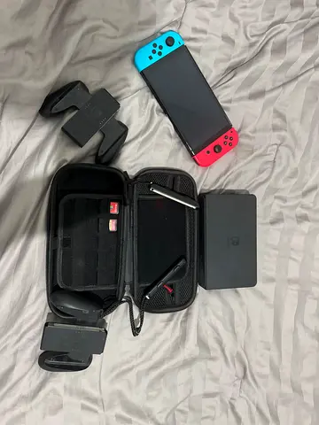 Amazing condition well kept Nintendo Switch Oled + Pro controller + games and other accessories.