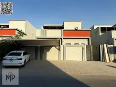 Ready-to-move-in villa with air conditioning, water, and electricity in Al Yasmin, directly behind t