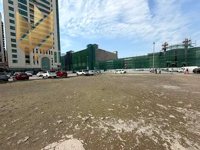 Open land for parking in Al Nahda (( Parking ))/ Price is negotiable /