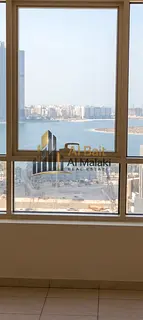 Three bedrooms and a living room with sea view for rent in Al Taawun .