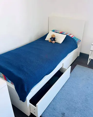Ikea single bed with mattress underneath 2 storage drawers available in perfect condition