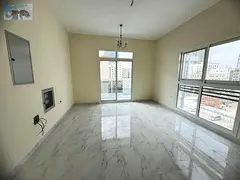 a distinctive two-bedroom apartment in Ajman, located on Kuwait Street in a prime location close to