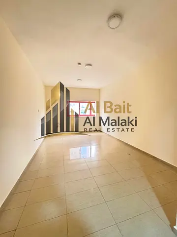 **2-Bedroom Apartment with Living Room in Al Qasimia | Central AC + Prime Location | Great Annual Rental Opportunity!**