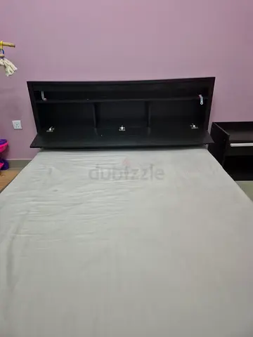Used double bed with storage headboard and matching bedside table